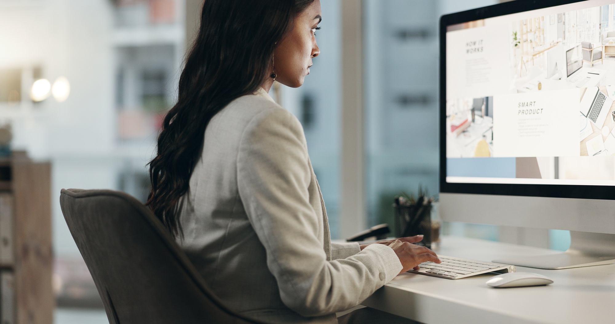 Computer, screen and business woman typing SEO research, company homepage layout or search website