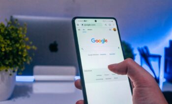 person holding white android smartphone