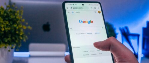 person holding white android smartphone