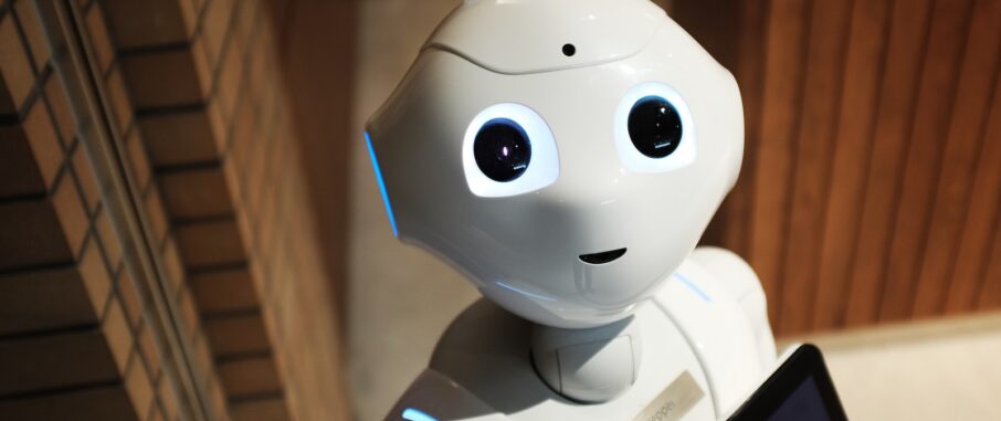 white robot near brown wall